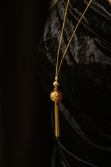 Liliflo_Bijoux modulables Swiss made_Sautoir doré pour femme avec murano confetti