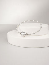 Traviata Cumingii Perlenarmband - Herzglied