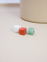 Coffret trois cubes Corail, Howlite et Aventurine