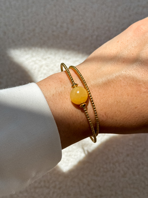 Liliflo_Bijoux modulables Swiss made_Bracelet interchangeable Milonga_couleur acier doré avec une pierre semi-précieuse Calcite jaune