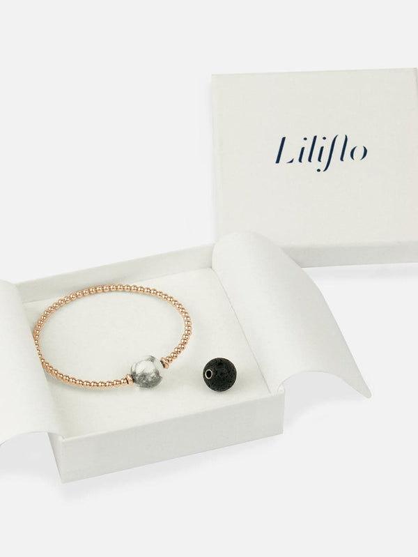 Coffret bracelet modulable Tango en couleur or rose avec des pierres semi-précieuses Howlite et Lave