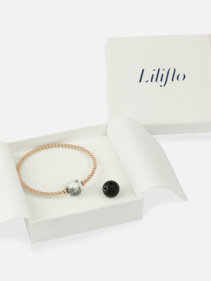 Coffret bracelet modulable Tango en couleur or rose avec des pierres semi-précieuses Howlite et Lave