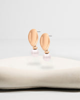 Liliflo_Bijoux interchangeable Swiss made_Boucles d'oreilles Giorgia en couleur acier rosé avec un décor interchangeable perle d'eau douce rose