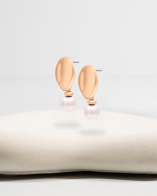 Liliflo_Bijoux interchangeable Swiss made_Boucles d'oreilles Giorgia en couleur acier rosé avec un décor interchangeable perle d'eau douce rose