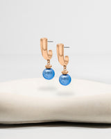 Liliflo_Bijoux interchangeable Swiss made_Boucles d'oreilles Iris en couleur acier rosé avec un lien murano neptune