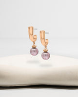 Liliflo_Bijoux interchangeable Swiss made_Boucles d'oreilles Iris en couleur acier rosé avec un lien murano pourpre light