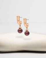 Liliflo_Bijoux interchangeable Swiss made_Boucles d'oreilles Iris en couleur acier rosé avec un lien murano pourpre