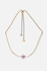 Collier interchangeable Swiss made - Collection Edelweiss Melanie Oesch - Collier couleur acier doré avec perles de culture et Lien murano pourpre light
