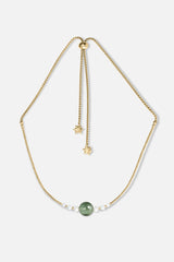 Collier interchangeable Swiss made - Collection Edelweiss Melanie Oesch - Collier couleur acier doré avec perles de culture et Lien Murano Tahiti