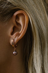 Liliflo_Bijoux interchangeable Swiss made_Boucles d'oreilles Iris en couleur acier rosé avec un lien murano pourpre light