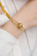 Bracelet acier doré double tour et zircons