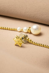 Liliflo - Boucles d'oreilles pendantes interchangeable Swiss made - Collection Edelweiss Melanie Oesch - Pendantes couleur acier doré avec perles de culture et Lien interchangeable en perle de culture