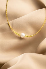 Collier interchangeable Swiss made - Collection Edelweiss Melanie Oesch - Collier couleur acier doré et Lien Perle de culture