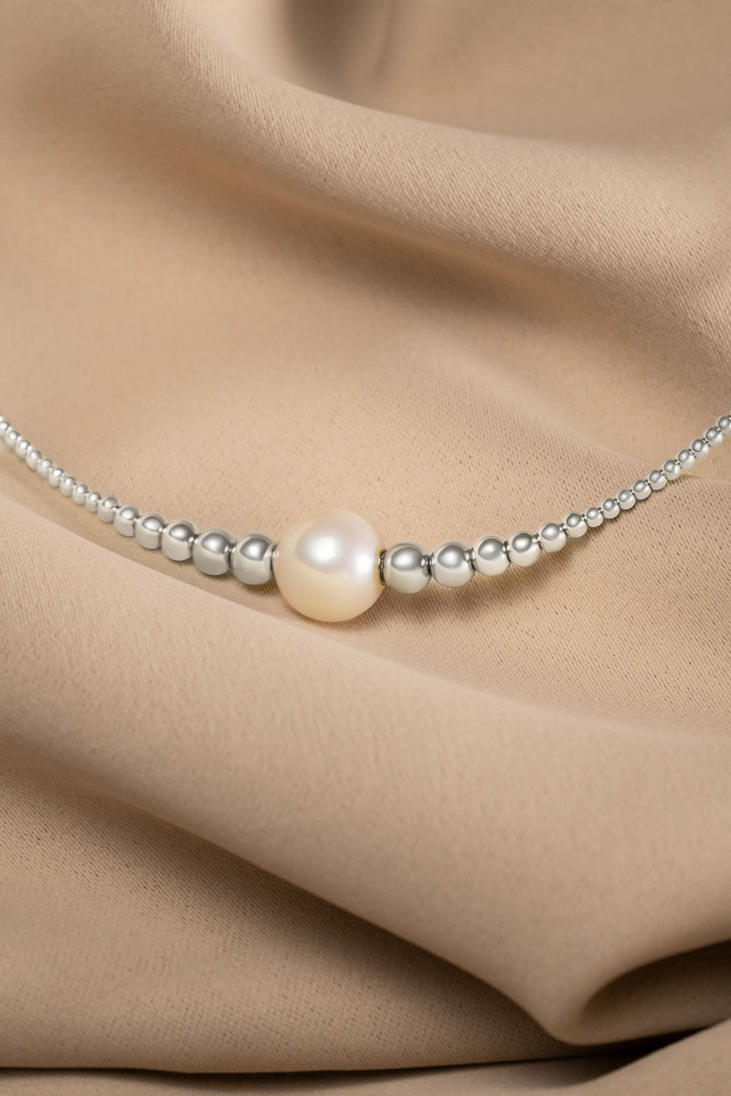 Collier interchangeable Swiss made - Collection Edelweiss Melanie Oesch - Collier couleur acier et Lien Perle de culture